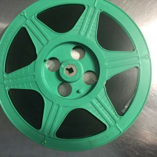 10.  5” Green Plastic Film Reel 16mm With Film And Case