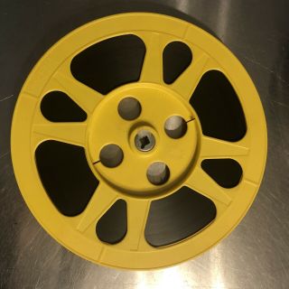 10.  5” Yellow Plastic Film Reel 16mm With Film And Case