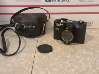 Minolta Hi Matic F Camera With Rokkor 1:2.  7 F=38mm Lens And Carrying Case