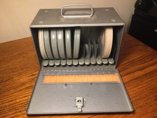 Brumberger 8mm Film Reel Storage Carrying Case With 7 Film Cans.  5 With Films.