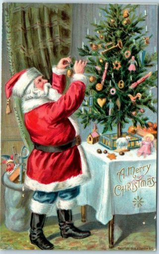 Vintage Christmas Postcard Santa Claus Hanging Ornament On Xmas Tree C1910s
