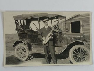 Vintage Photo Man In Suit Standing In Front Of Model T Car With Saxophone