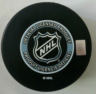 FLORIDA PANTHERS NHL INGLASCO OFFICIAL HOCKEY PUCK MADE IN SLOVAKIA SMUDGED MARK 3