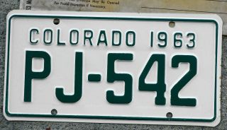 Near 1963 Green On White Colorado Motorcycle License Plate Arapahoe County