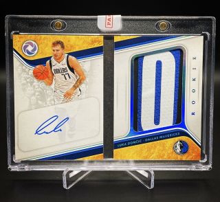 2018 - 19 Opulence Luka Doncic Rookie Patch Autograph Booklet Nameplate 2/6