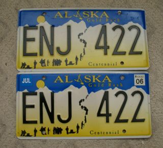 A57 - Alaska Gold Rush Centennial License Plate Pair Enj - 422