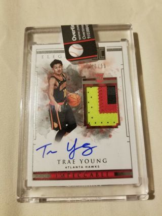Trae Young Impeccable Elegance,  Rc,  Auto,  Game Worn Jersey W 3 Clrs,  Pack Fresh