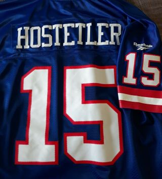 Throwback Jeff Hostetler Ny Giants Jersey,  Bucket Hat,  And Player Trading Cards.