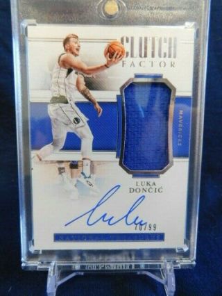 2018 - 2019 National Treasures Clutch Factor Luka Doncic Auto 70/99