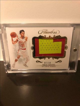 2018 - 19 Panini Flawless Uncirculated Rookie Patches Patch Trae Young 07/10
