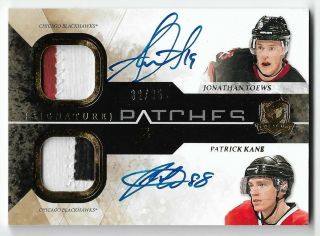10 - 11 The Cup Dual Signature Patches Patrick Kane & Jonathan Toews Auto 32/35